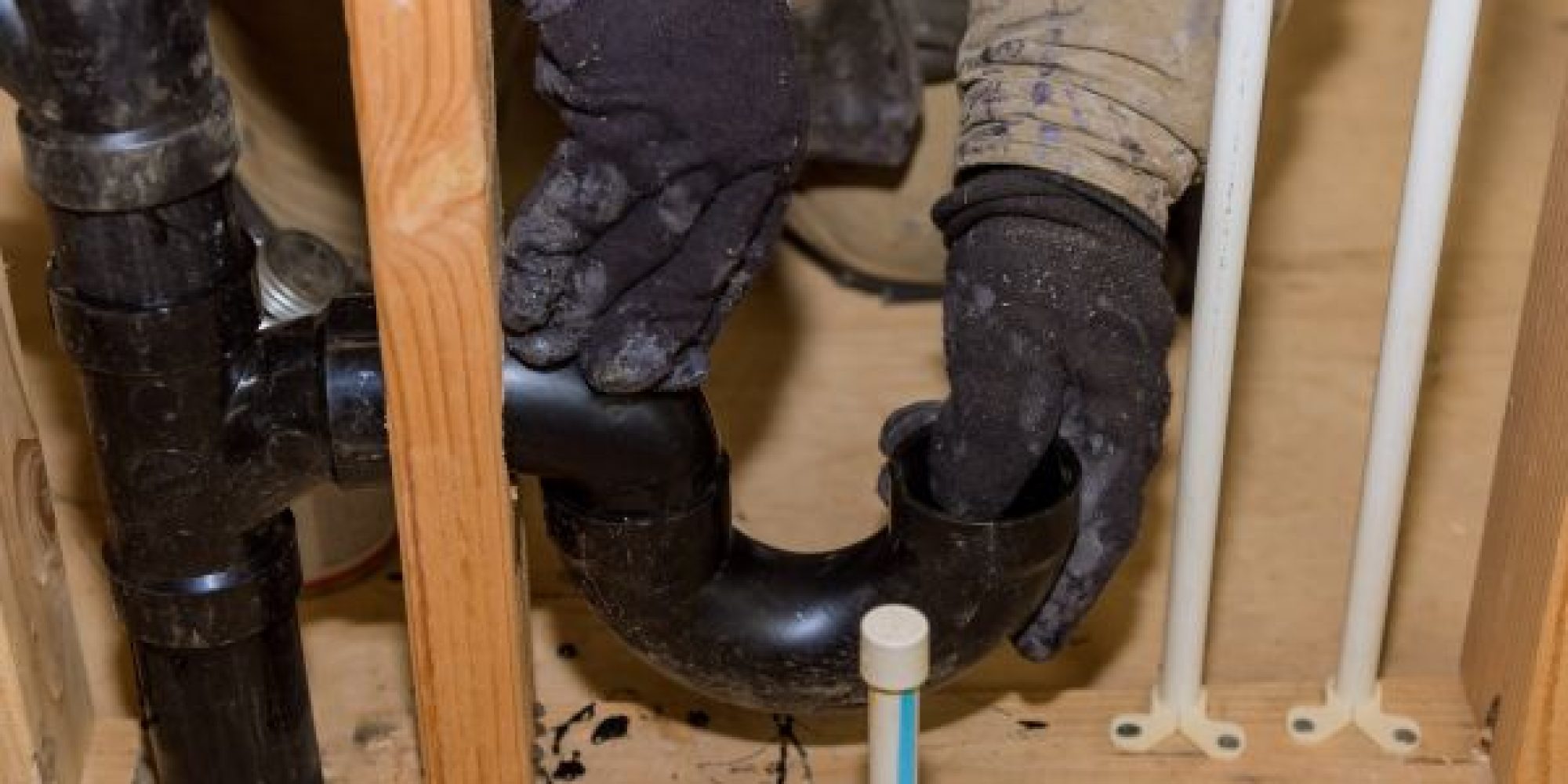 worker-is-using-glue-with-fitting-for-installing-t-2025-04-02-23-42-27-utc-1